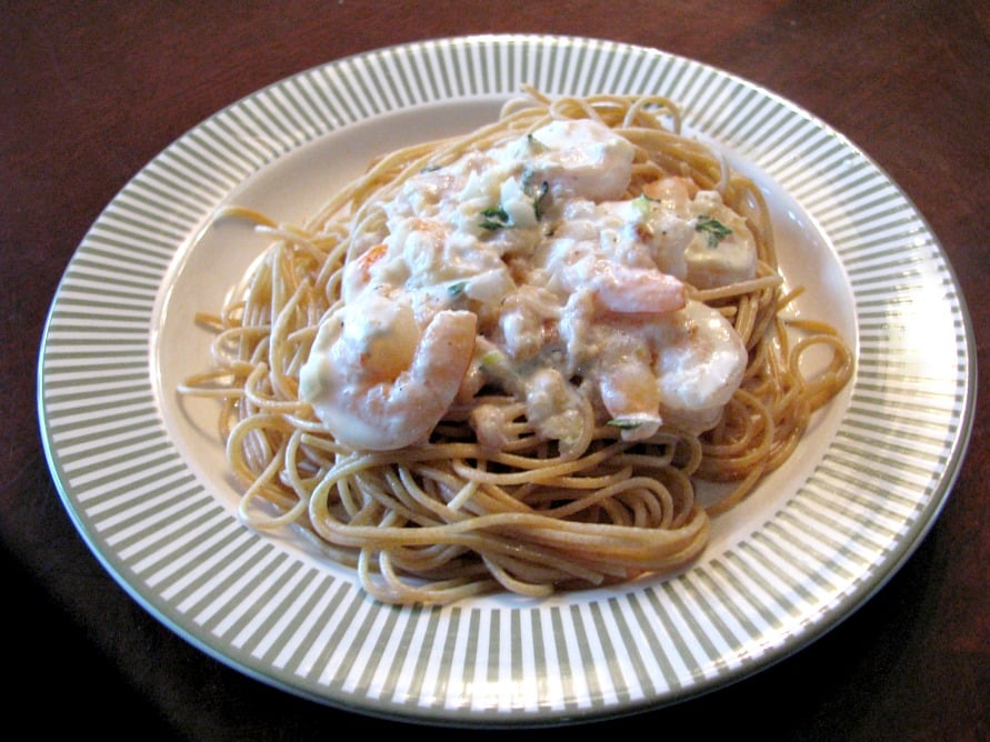 Shrimp in a Lemon Thyme Cream Sauce- Deliciously seasoned shrimp in a lemon thyme cream sauce. Easy to make, using pre-cooked shrimp, this change-up to regular spaghetti night is ready in 30 minutes!