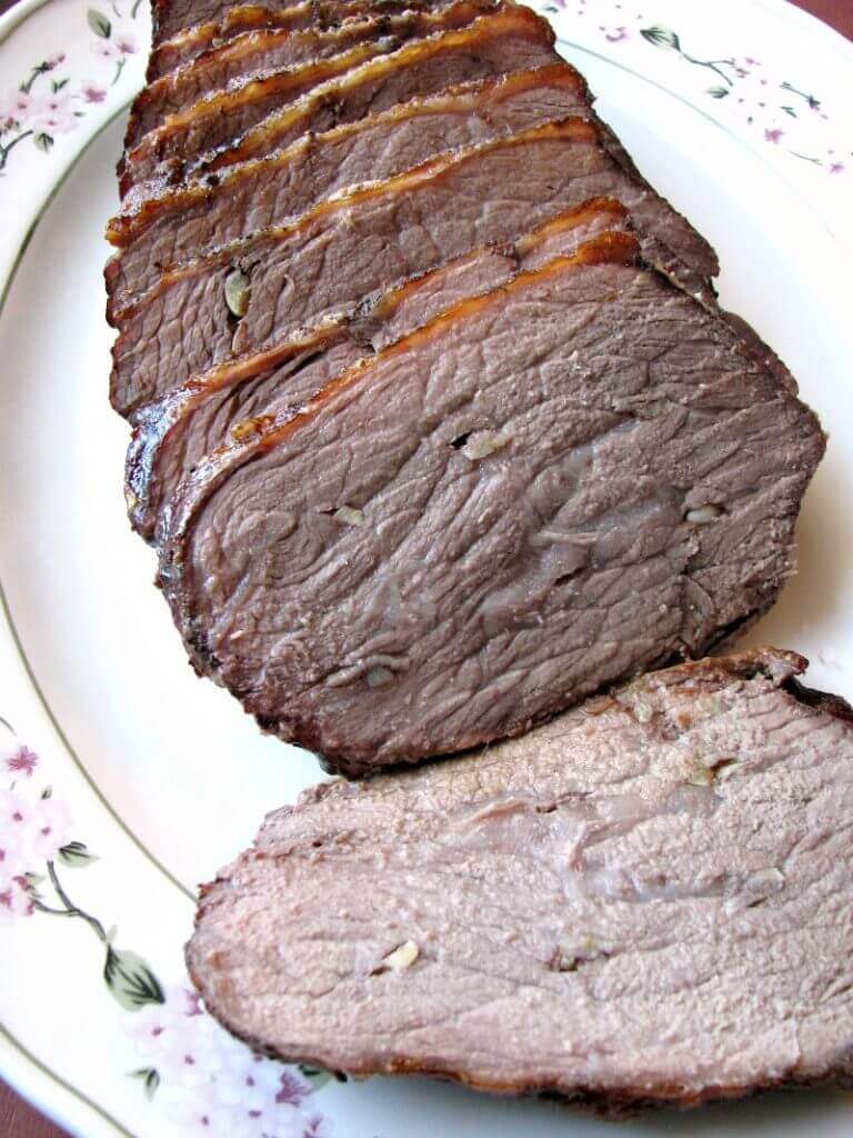 Garlic Roast Beef is easier to make at home than you think! Perfect for Sunday dinner, flavorful and juicy roast beef your whole family will love. 