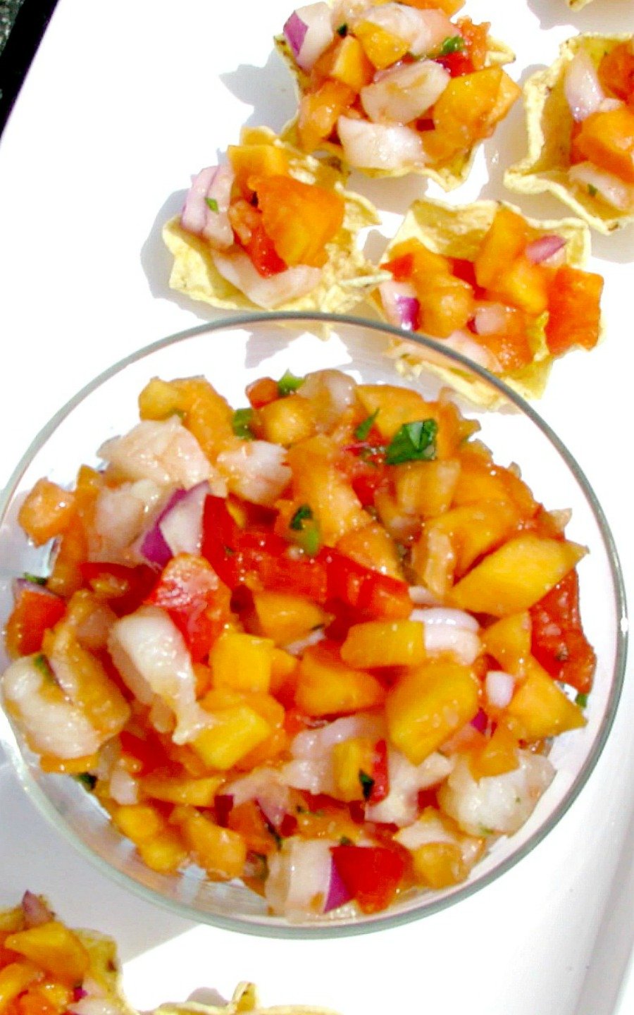 Shrimp and Papaya Salsa- Sweet papaya, chopped shrimp, onions, and jalapeno give you all the great tastes of summer. This recipe feeds a crowd, great for summertime cookouts! 