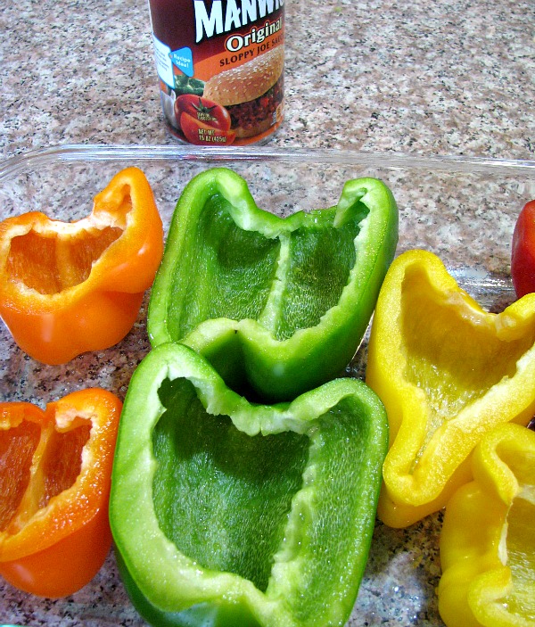 Cut bell peppers in baking dish. 