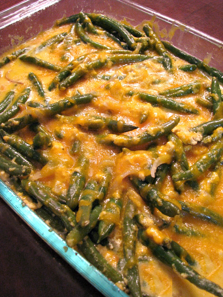 Fresh Green Bean Casserole- This non-traditional green bean casserole is made with fresh green beans and caramelized onions in a cheddar cheese sauce. The perfect Thanksgiving side dish! 
