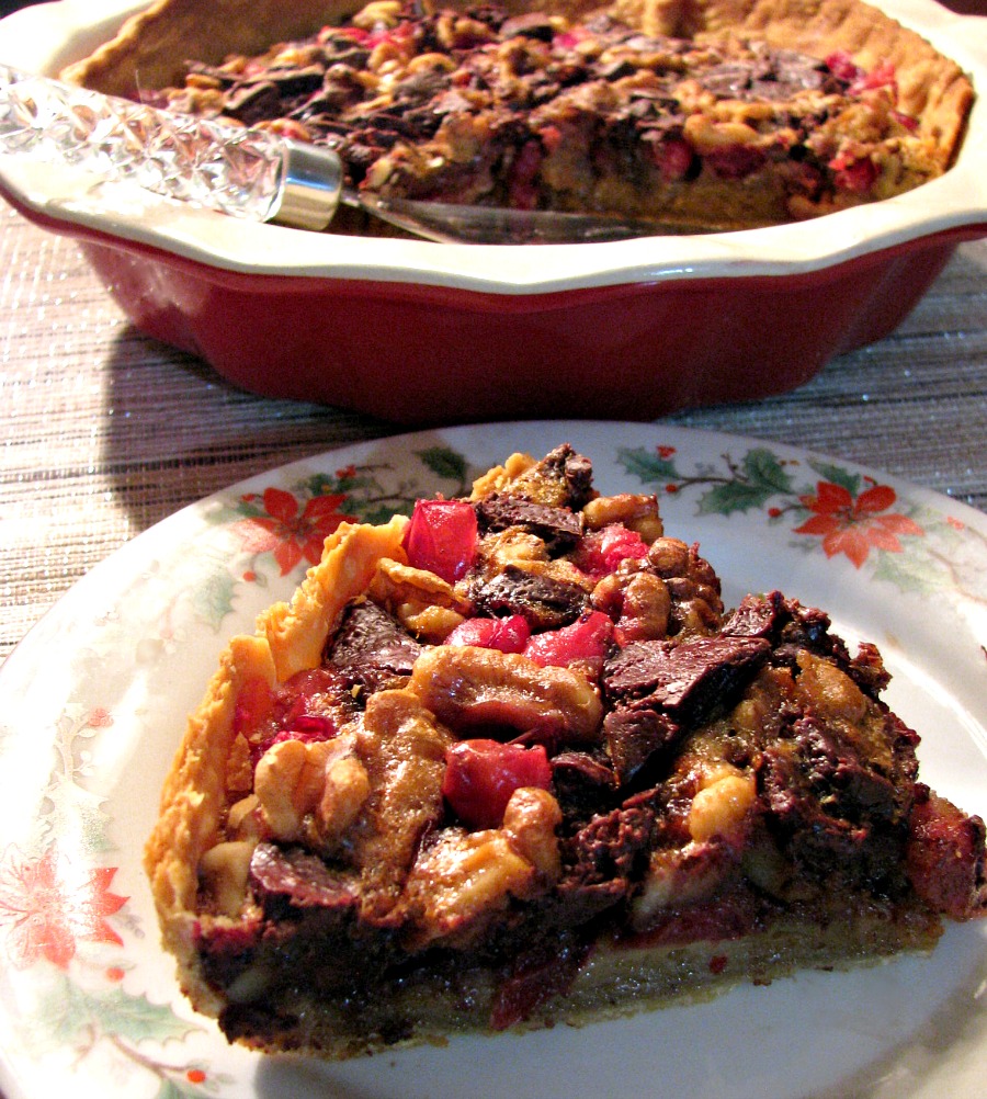 This festive Chocolate Walnut Cranberry Pie is both sweet and tart, and a great change from a typical pecan pie, making it a great addition to any holiday dessert table.
