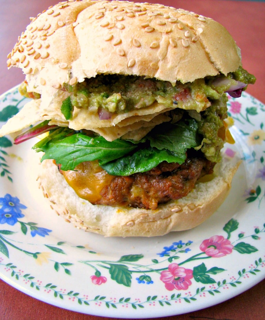 Switch up Taco Tuesday with these quick and easy Taco Burgers made with taco seasoning and topped with your favorite taco toppings. 