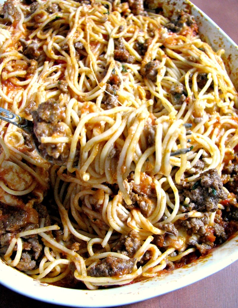  This Leftover Spaghetti Casserole comes together quickly and easily, with ground beef or turkey, Mozzarella and American cheeses, and store-bought sauce.