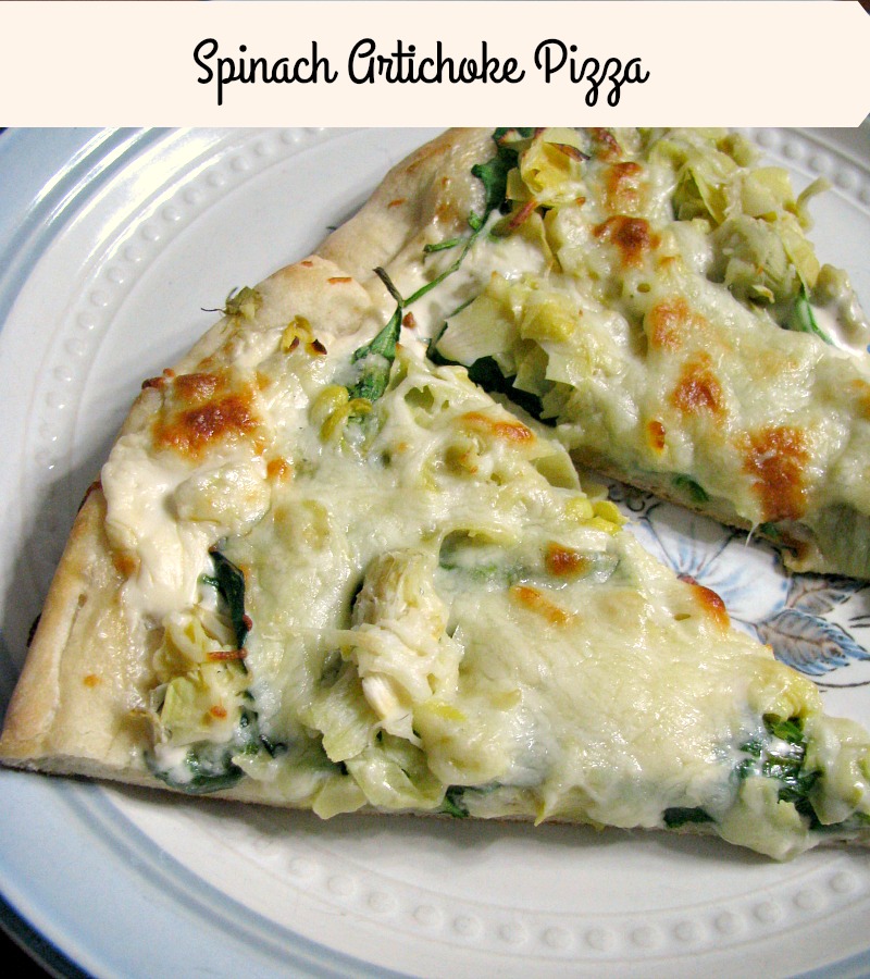Quick and easy Spinach Artichoke Pizza, made with store-bought pizza dough, canned artichoke hearts, fresh spinach, and Alfredo sauce makes a great meatless meal.
