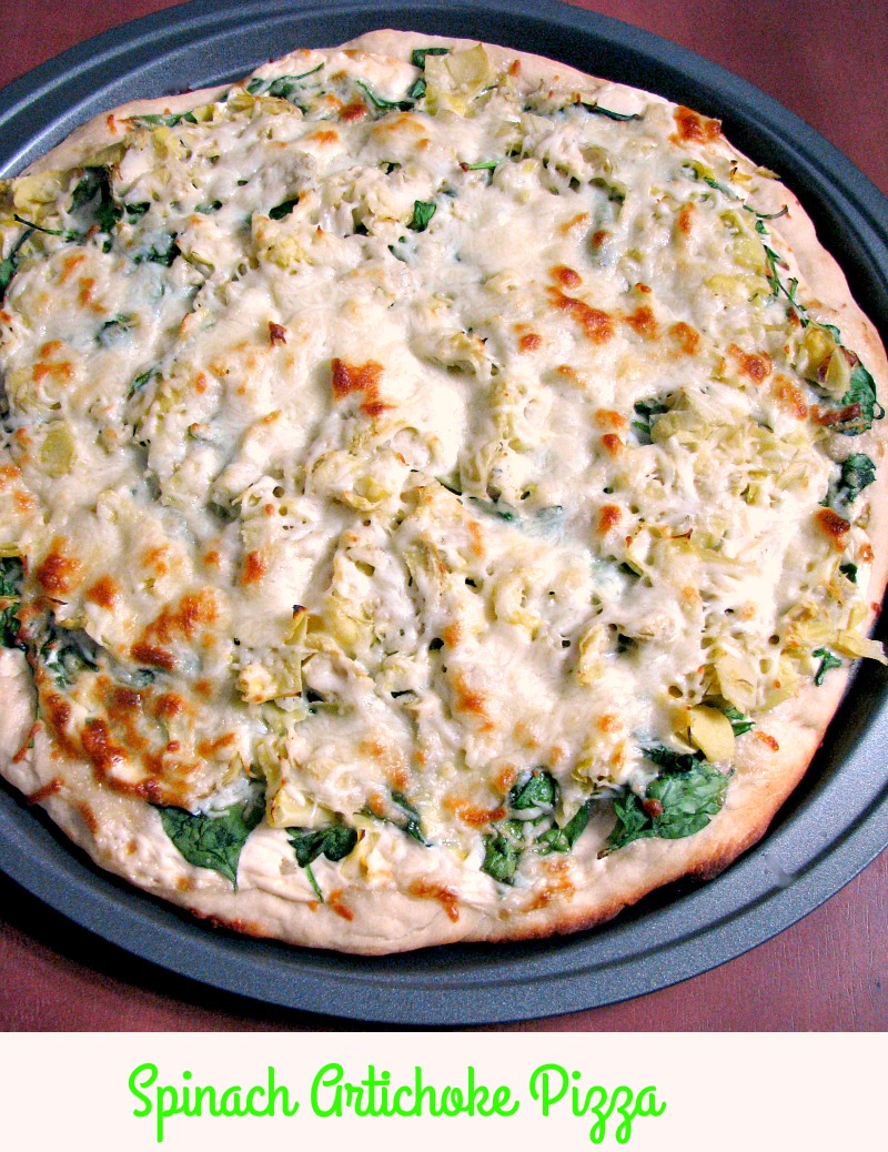 Quick and easy Spinach Artichoke Pizza, made with store-bought pizza dough, canned artichoke hearts, fresh spinach, and Alfredo sauce makes a great meatless meal.