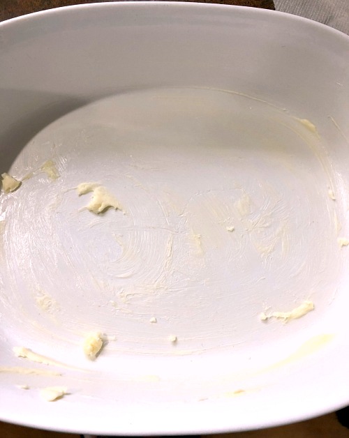 photo of a buttered baking dish 