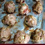 Perfect Meatballs, made with a mixture of ground beef, pork, veal, onions, garlic, and Italian seasonings. They are great on their own, for spaghetti and meatballs, or in a meatball sub.