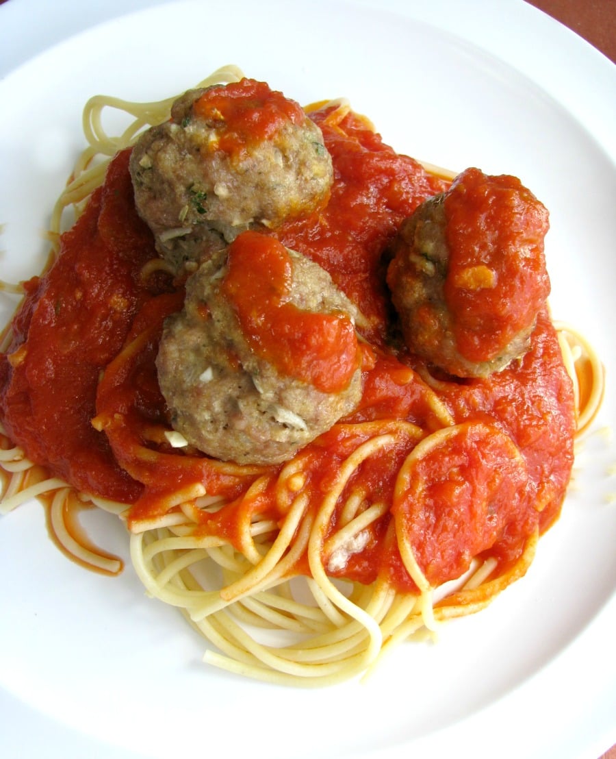 Perfect Meatballs, made with a mixture of ground beef, pork, veal, onions, garlic, and Italian seasonings. They are great on their own, for spaghetti and meatballs, or in a meatball sub. 