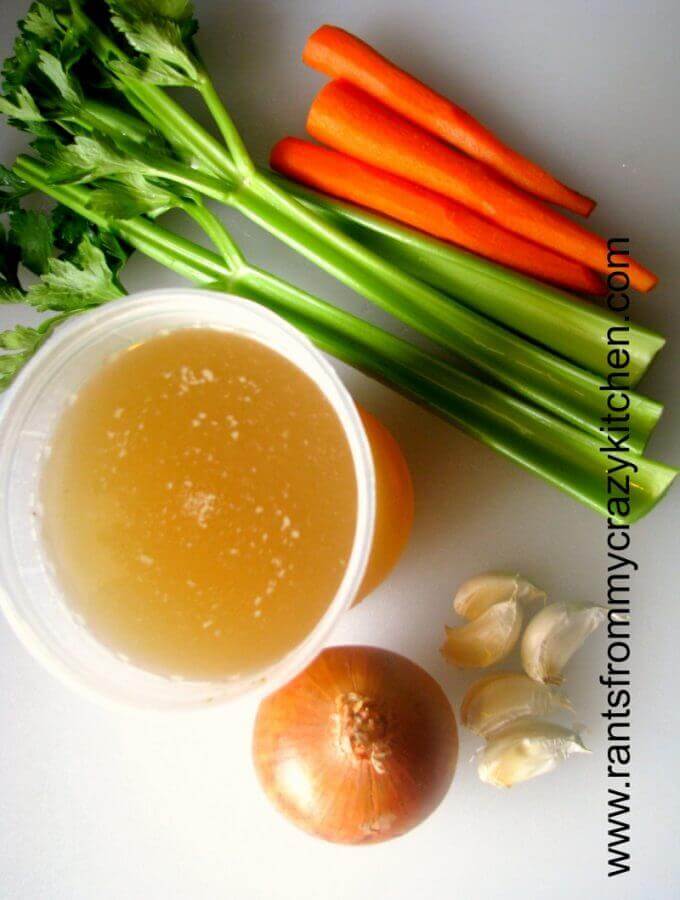 Flavorful homemade Roasted Chicken Broth, lower in sodium than store-bought. Made with freshly roasted bones, carrots, celery, onions, garlic, and fresh herbs, homemade broth is easy to make and great to freeze for use anytime!