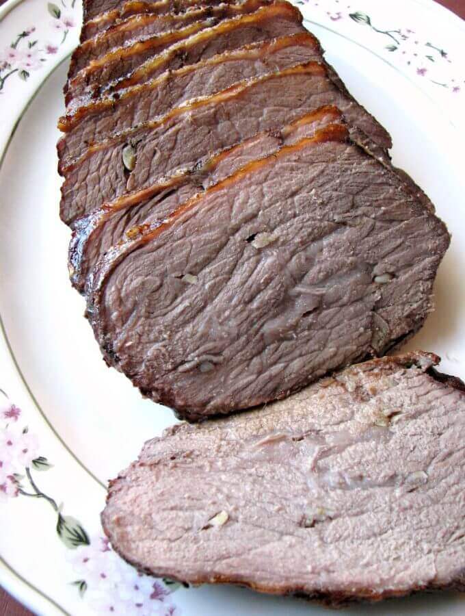 Garlic Roast Beef is easier to make at home than you think! Perfect for Sunday dinner, flavorful and juicy roast beef your whole family will love.