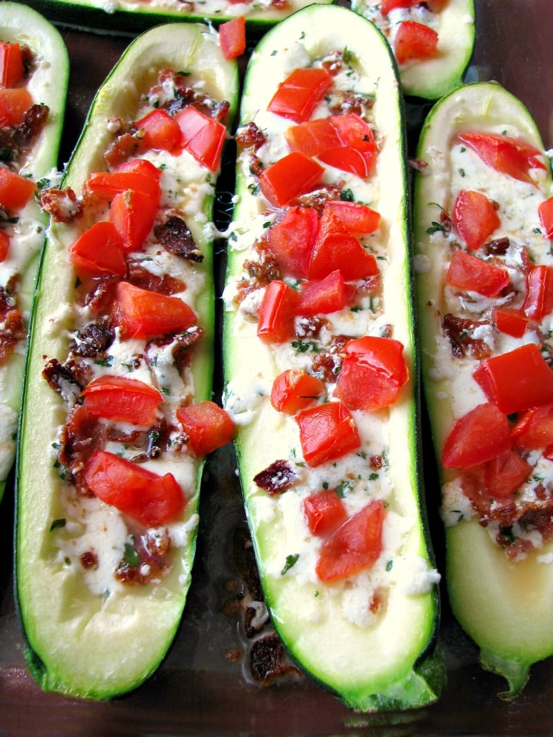 Use up the abundance of summer zucchini with these outstanding Bacon Mozzarella and Tomato Stuffed Zucchini Boats that are ready to eat in 30 minutes.