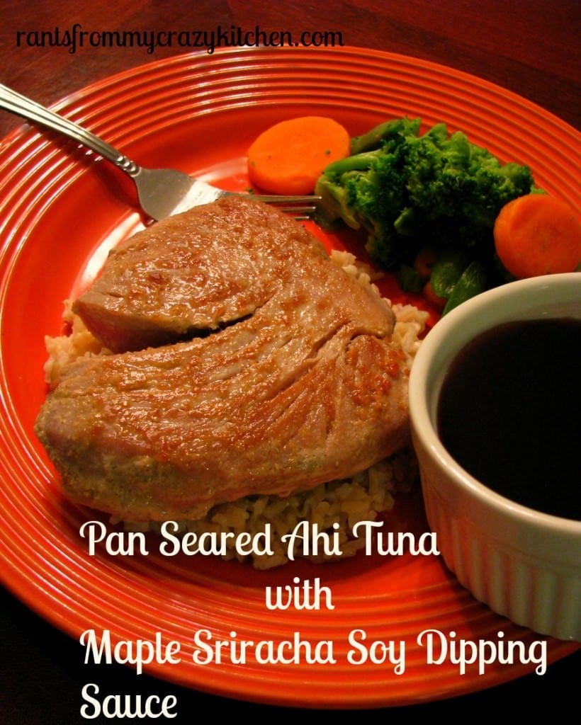 photo of a plate with pan seared ahi tuna with a bowl of maple sriracha soy sauce and vegetables on the side
