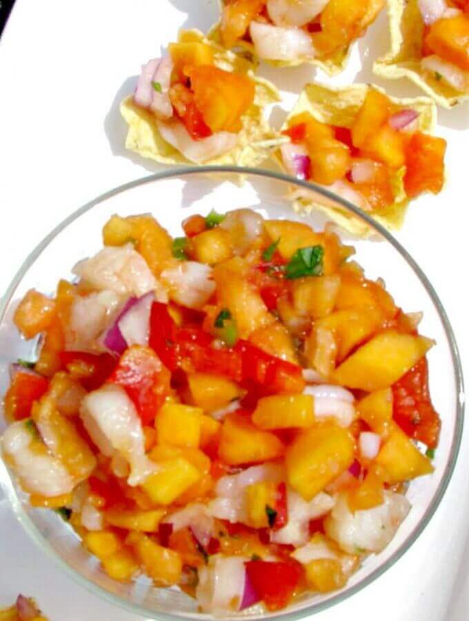 Shrimp and Papaya Salsa- Sweet papaya, chopped shrimp, onions, and jalapeno give you all the great tastes of summer. This recipe feeds a crowd, great for summertime cookouts!