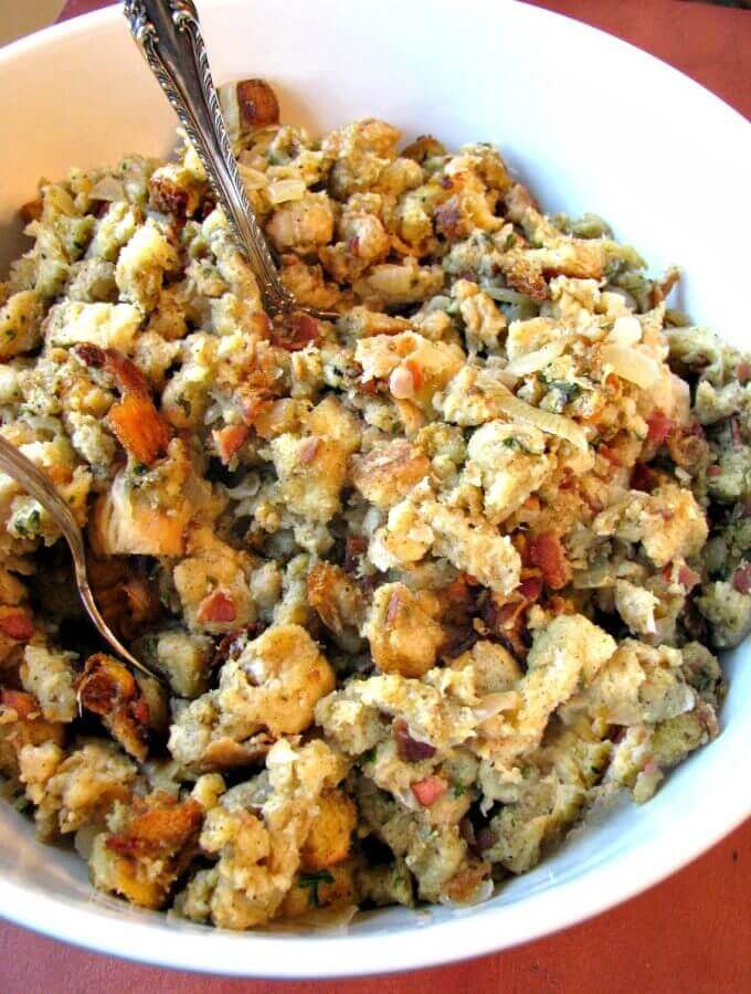 Slow Cooker stuffing loaded with bacon, sauteed onions, and sage. Save room in your oven by making your stuffing easily in your slow cooker.