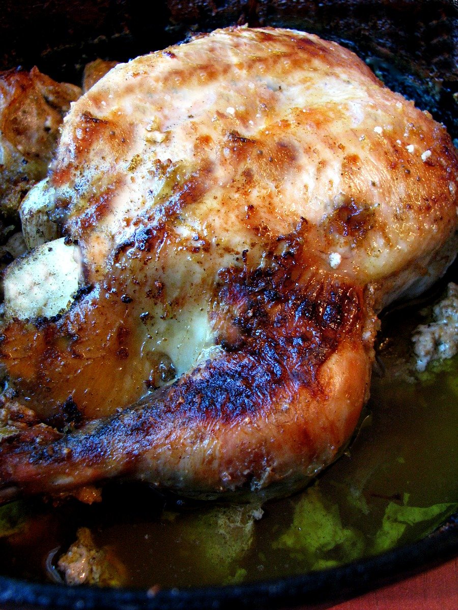 Chicken in Milk recipe adapted from Jamie Oliver- Chicken in Milk is a great change from traditional roasted chicken, and so easy to make. A whole chicken is braised in milk, along with lots of garlic and lemon, creating a fabulous sauce.