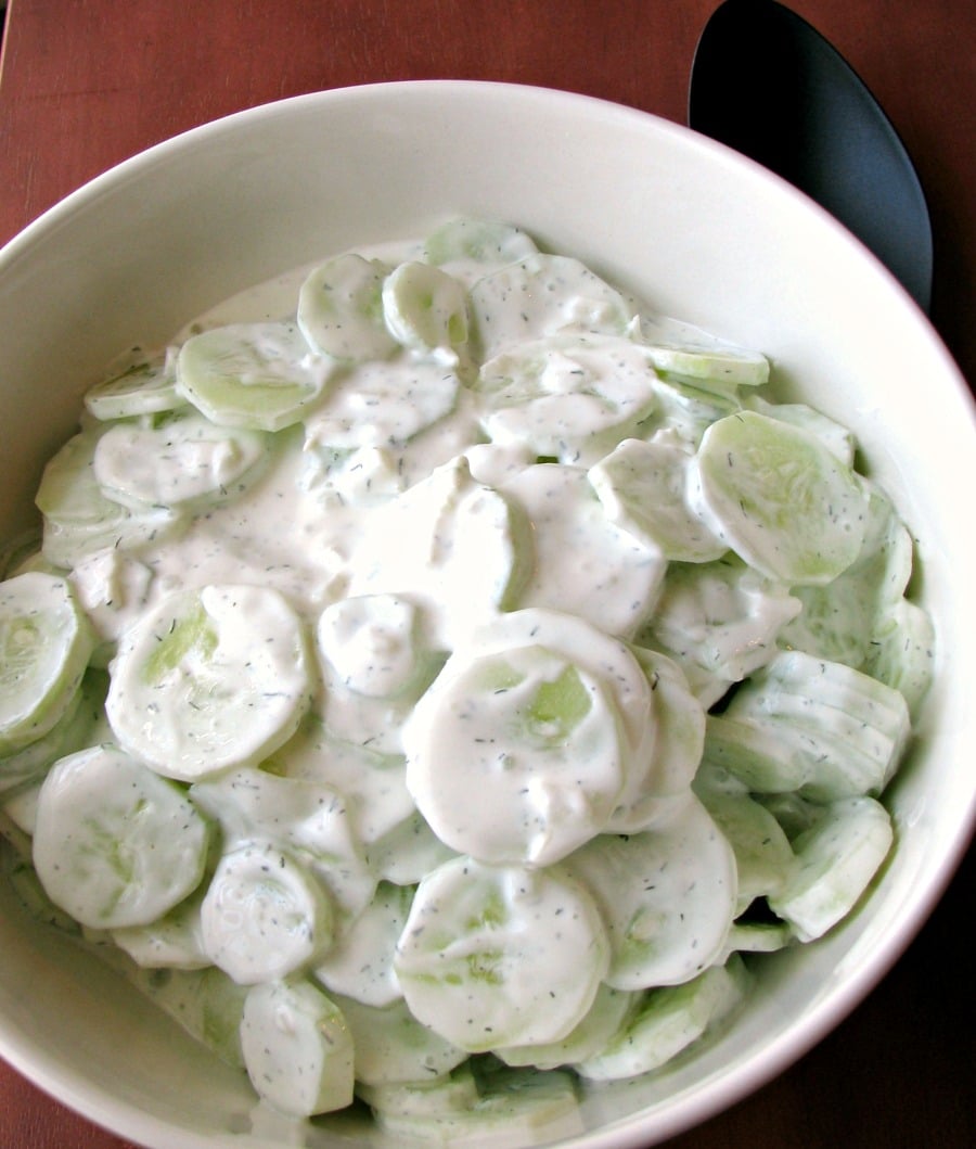With garden fresh cucumbers, onions, and sour cream, this Creamy Cucumber Salad is a cool, refreshing summer salad great for cookouts or light dinners.