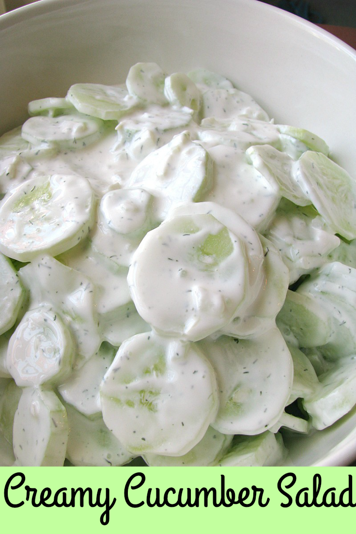 Close up photo of Creamy Cucumber Salad in a white bowl
