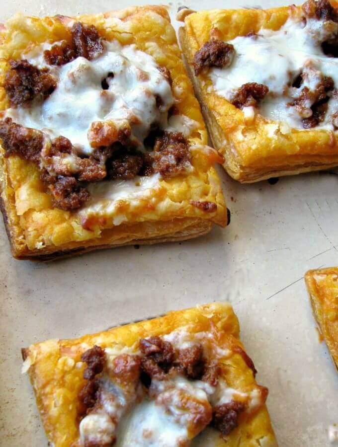 Cheesy Mexican Chorizo Puff Pastry Tarts are a spicy, cheesy, flaky appetizer everyone will love!