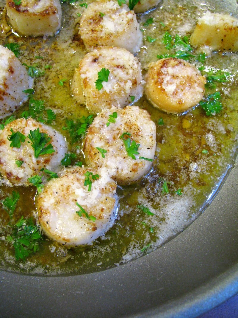 Photo of a pan of browned butter garlic parmesan scallops