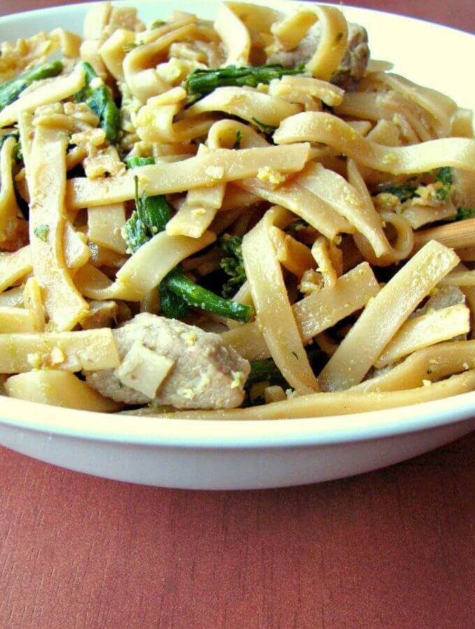 Pad See Ew ( meaning "fried with soy sauce") is made with large rice noodles, pork loin, broccoli, and scrambled eggs fried in soy sauce. Makes a great weeknight dinner and better than takeout!