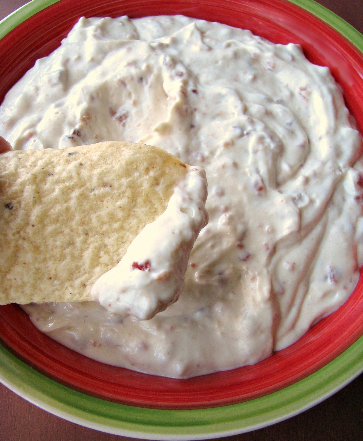 Photo of Homemade Bacon Horseradish Dip in a colorful bowl.