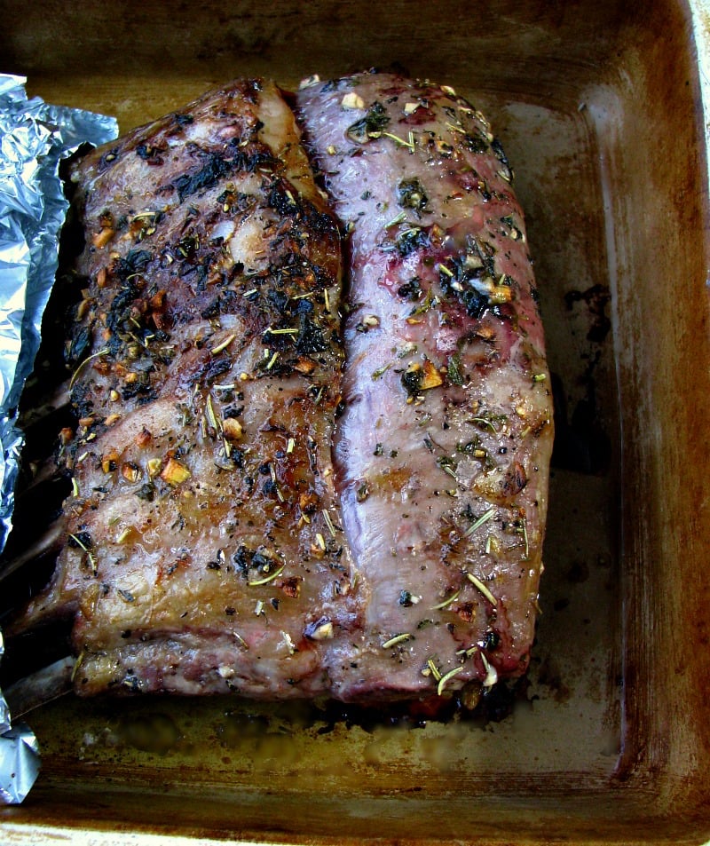 Classic Herbed Rack of Lamb, marinated in olive oil, garlic, and fresh herbs, makes a simply elegant main course for Easter. 