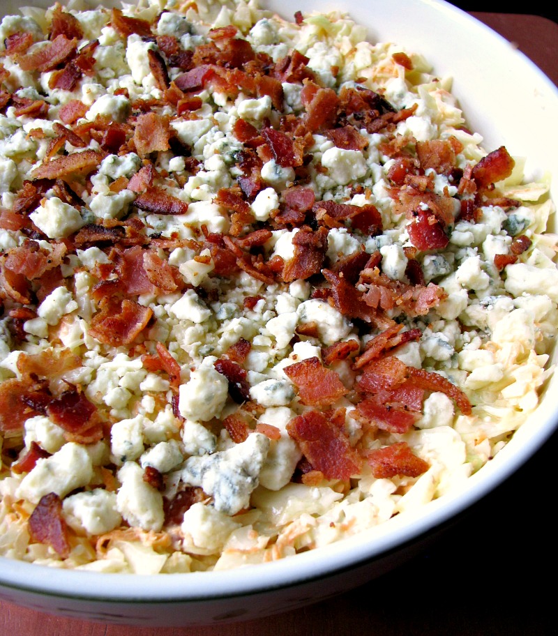 Bacon Blue Cheese Cole Slaw, made with fresh cabbage, carrots, blue cheese crumbles, and crispy bacon, is the perfect salad for all your summer cookouts.