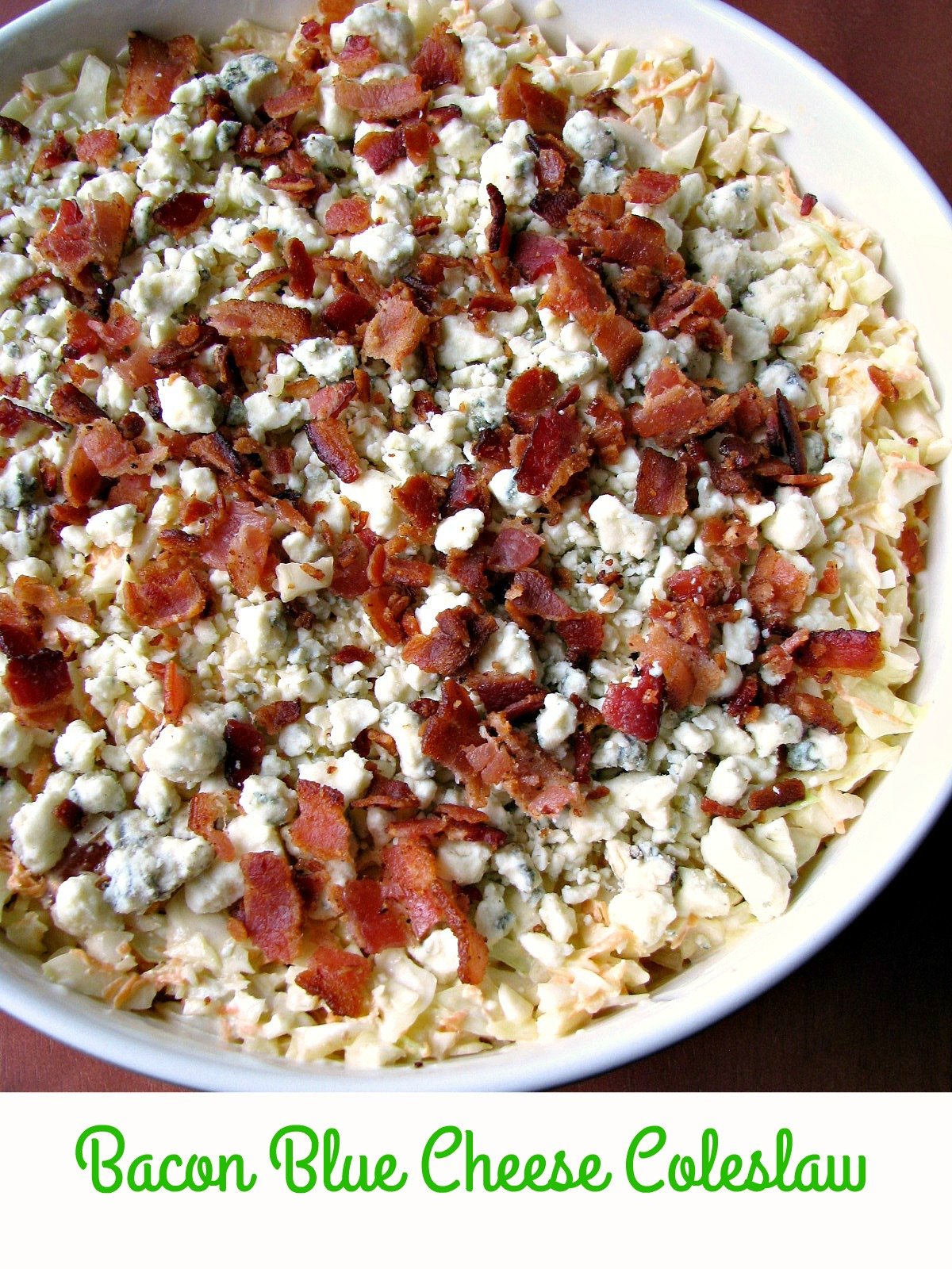 Bacon Blue Cheese Coleslaw, made with fresh cabbage, carrots, blue cheese crumbles, and crispy bacon, is the perfect salad for all of your summer cookouts.