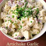 Creamy, tangy, Artichoke Garlic Potato Salad made quickly and easily with just a few ingredients. This potato salad is flavorful but not overpowering!