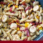 Quick and easy One Pot Chicken Sausage Pasta made with precooked chicken sausage, bell peppers, onions, and sun dried tomatoes makes a great weeknight summertime dinner. 