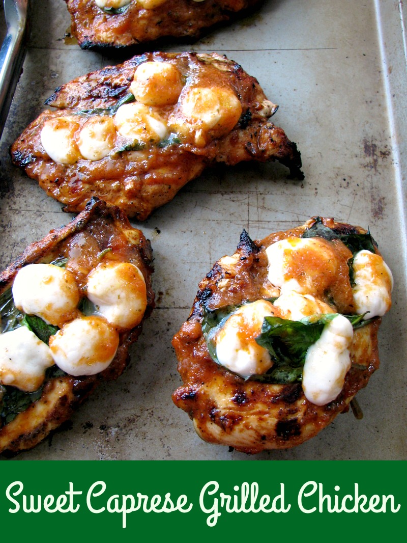 Grilled Sweet Caprese Chicken is made with chicken breasts marinated in a sweet cherry tomato sauce, grilled and topped with basil and mozzarella cheese.