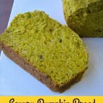 This Savory Pumpkin Bread is filled with pumpkin puree and fresh herbs.  It's perfect for stuffing, or serving in a basket for Thanksgiving dinner.