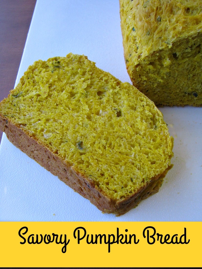 This Savory Pumpkin Bread is filled with pumpkin puree and fresh herbs.  It's perfect for stuffing, or serving in a basket for Thanksgiving dinner.