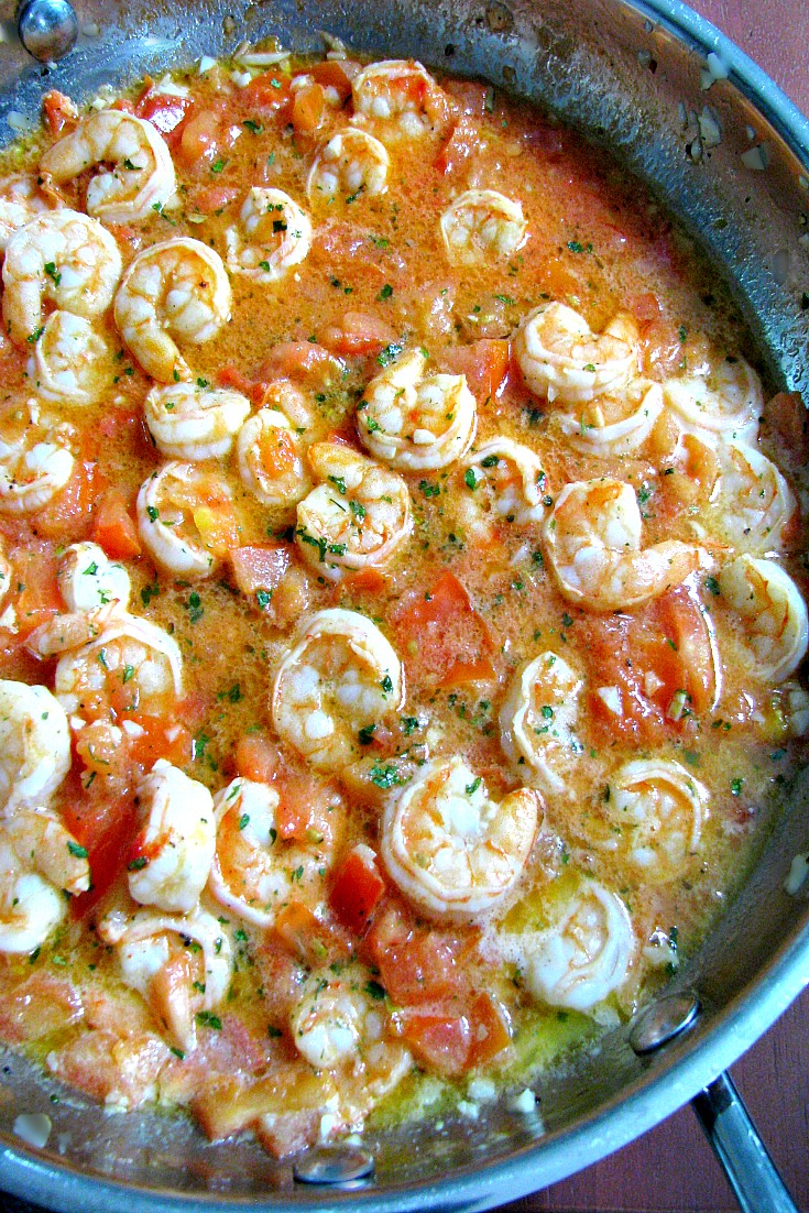 A delicious change from traditional shrimp scampi, Red Shrimp Scampi is made with lots of garlic, tomatoes, parsley, and black pepper in butter sauce. 