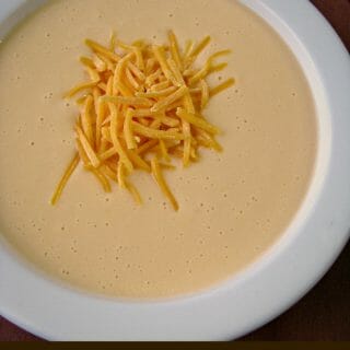 Creamy Instant Pot Cheesy Cauliflower Soup with puréed cauliflower, cream cheese, and cheddar cheese, is quick and easy to make, the perfect Winter comfort food, and great for those just learning to use an Instant Pot pressure cooker.