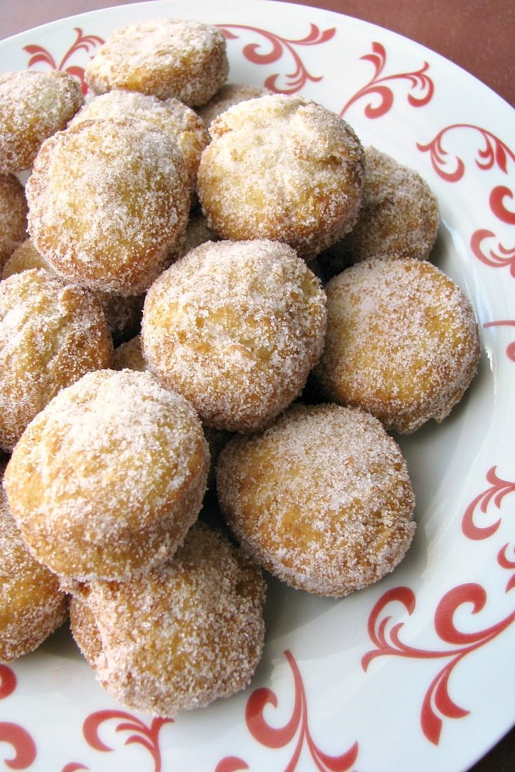 Close up photo of Chinese Sugar Donuts on a white and red plate 