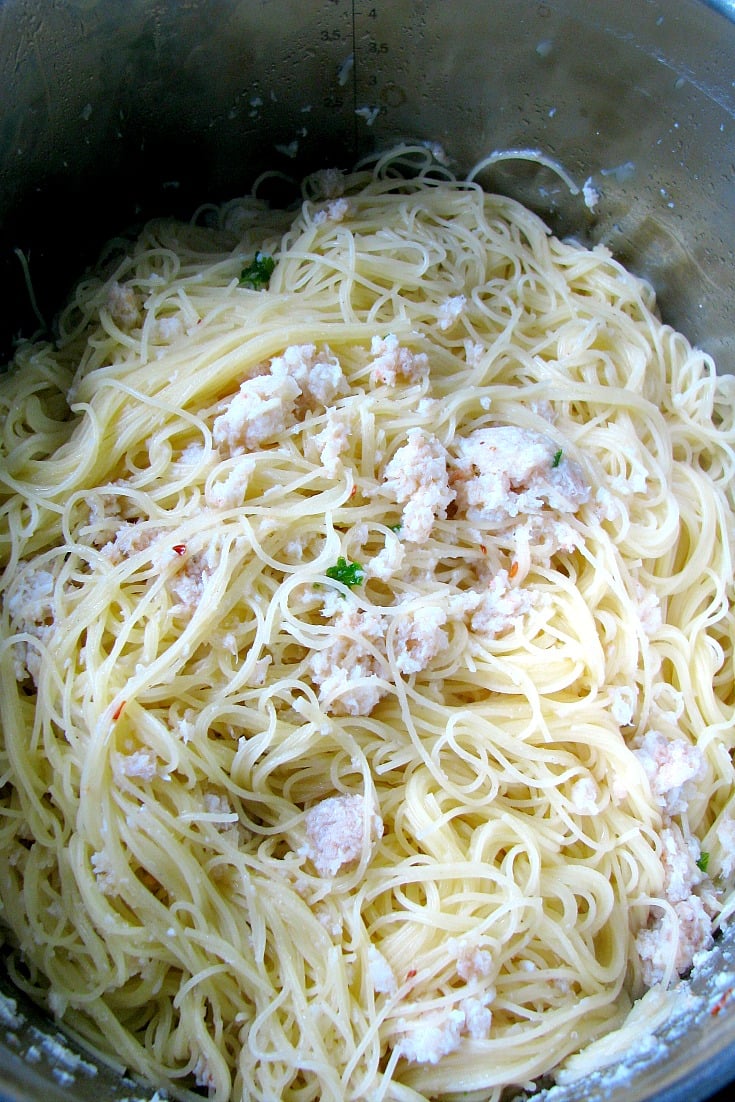 Photo of Garlic Butter Crab Pasta in a stainless steel pot