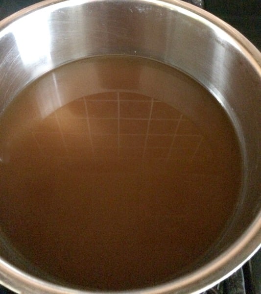 Photo of chicken broth in a pot 
