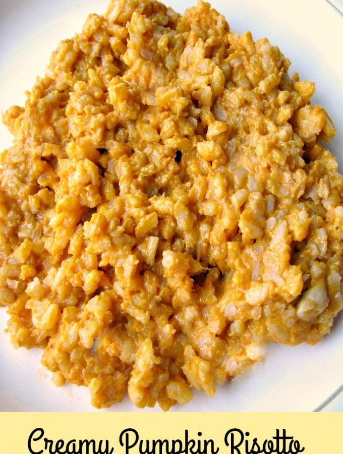 Close up photo of Creamy Pumpkin Risotto on a white plate