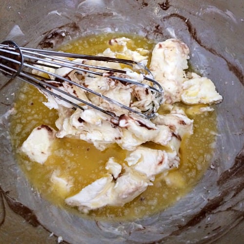 Photo of cream cheese being mixed with melted butter