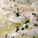 Photo of Baked Flounder with Lemon Garlic Butter in a glass baking dish