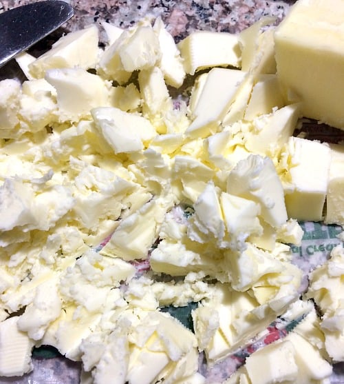 Photo of chopped butter on a butter wrapper