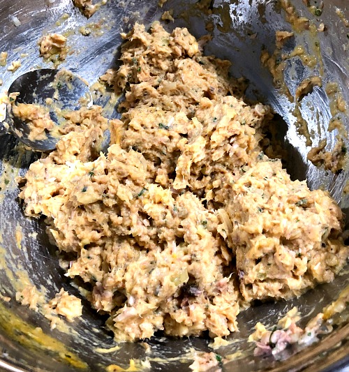 photo of uncooked salmon patty mixture in a metal bowl