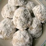 Photo of a white flower trimmed plate full of Walnut Crumb Cookies
