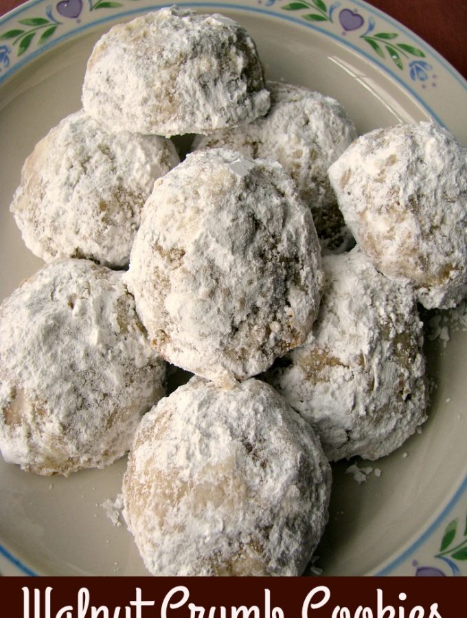 Photo of a white flower trimmed plate full of Walnut Crumb Cookies