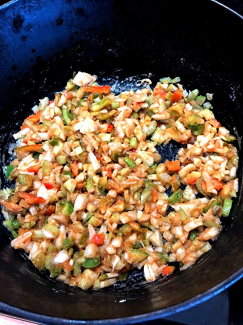 photo of chopped celery onions and bell pepper cooked in roux