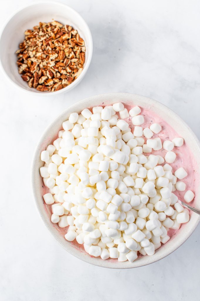photo of bowls of miniature marshmallows and pecans