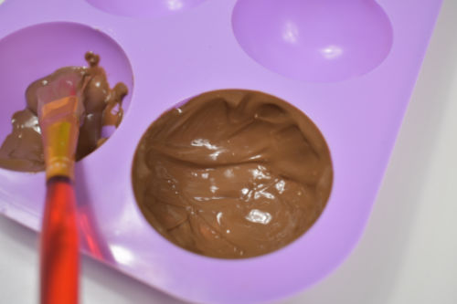 melted chocolate in a silicone mold 